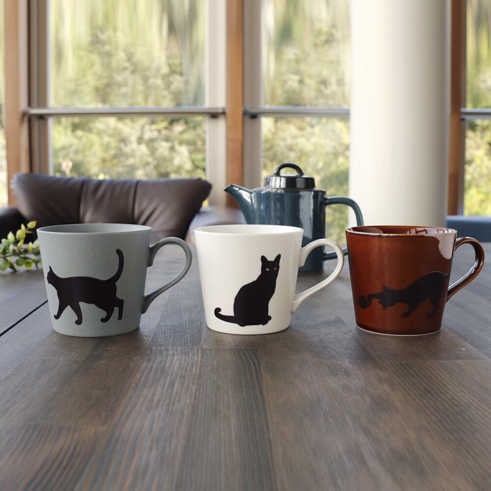Magic Cat Mug — black silhouette before heat, Made in Japan Mino Ware